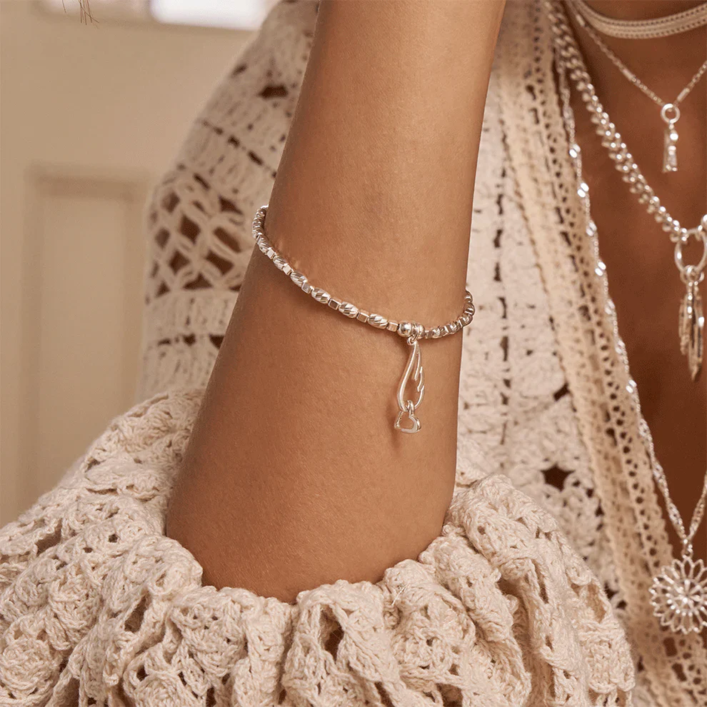 SOUL GLOW INTERLOCKING HEART AND ANGEL WING BRACELET - Image 2